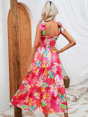 Tropical tie-strap smocked midi dress in strawberry with tiered floral skirt.