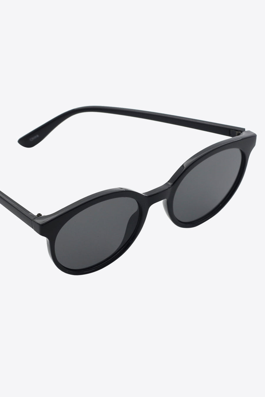 Black round frame sunglasses with dark lenses