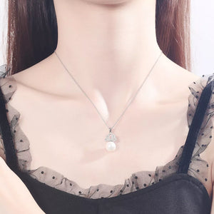 Synthetic Pearl,925 sterling silver,Zircon Care instructions: Avoid wearing duri necklace in Cream with straight silhouette
