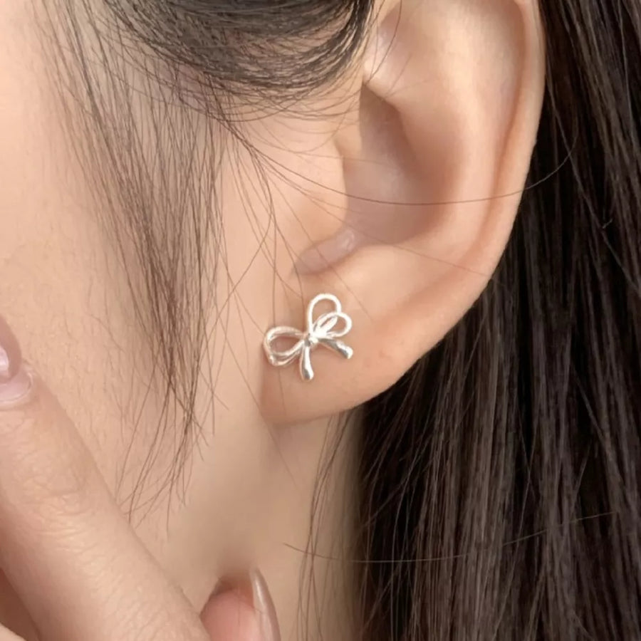 silver earrings with stud earrings and not applicable