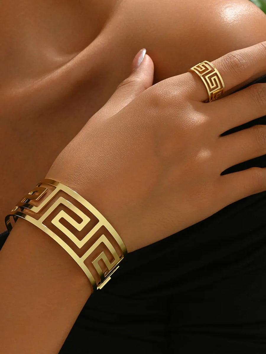 Gold jewelry set featuring gold-plated and geometric