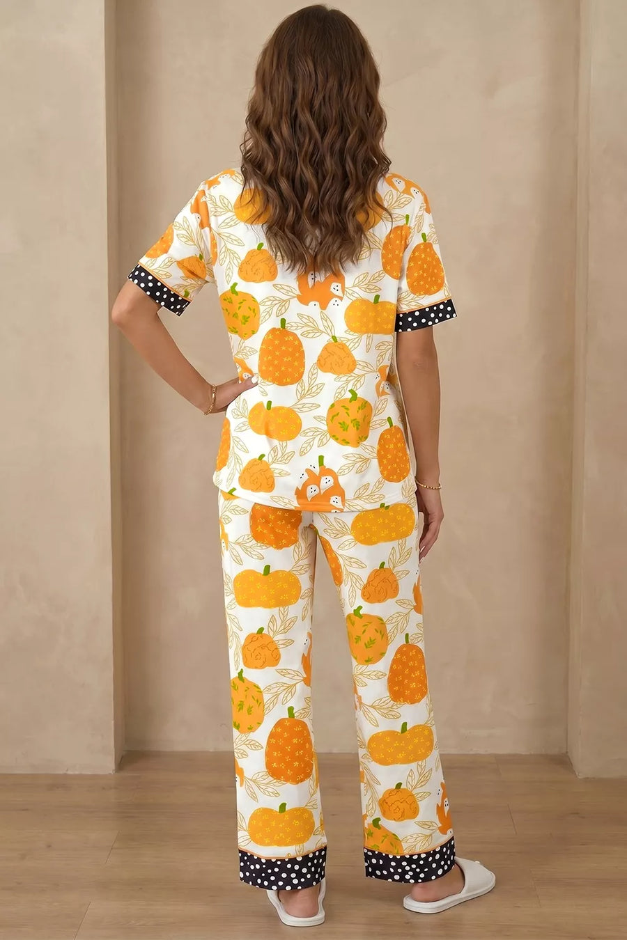 pajama set in orange with novelty print and buttoned