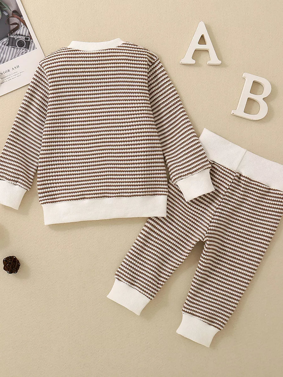 Baby knit set with brown and white stripes, long sleeves, and ribbed cuffs and hem.