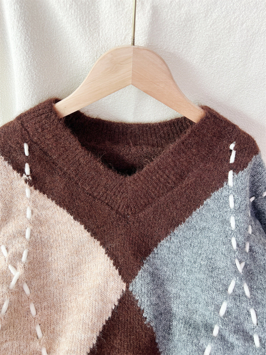 v-neck sweater in dark brown with argyle and stretch