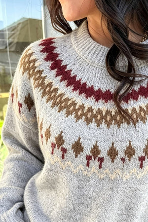 69% polyester, 23% acrylic, 6% wool, 2% elastane Care instructions: Machine wash pullover sweater in brown with relaxed