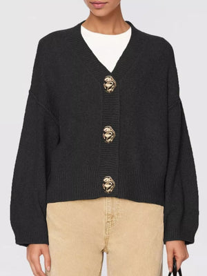 65% Recycled Polyester 13% Polyamide 13% Acrylic 6% Wool 3% Spandex Care instruc cardigan in Apricot with relaxed silhouette
