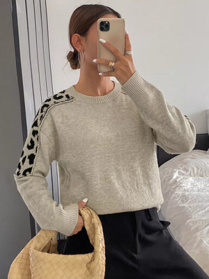 beige pullover sweater with hip-length and pullover
