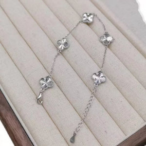 bracelet featuring four-leaf clover in silver with 925 sterling silver Care instructions: Avoid wearing during exercise, as