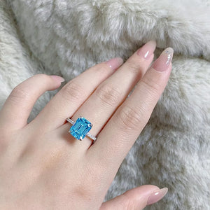 ring in sky blue featuring rectangle cut stone and rectangle fit