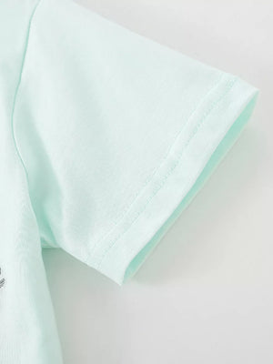 Light blue baby polo shirt with embroidered animal detail on chest