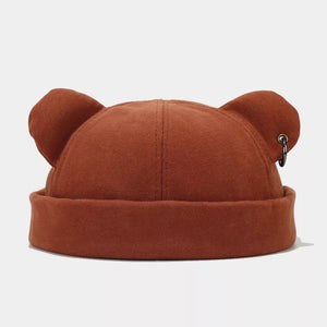 hat in rust featuring bear ears and fitted fit