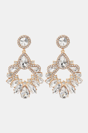 Transparent jeweled chandelier drop earrings with alloy setting and gold tone.