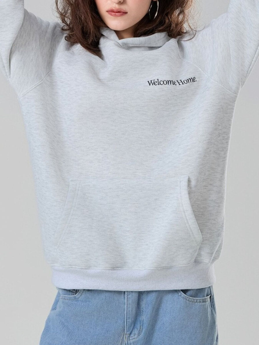 pullover hoodie in light gray featuring pocketed and relaxed fit