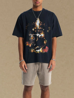 Black oversized t-shirt with abstract graphic print and crew neck.