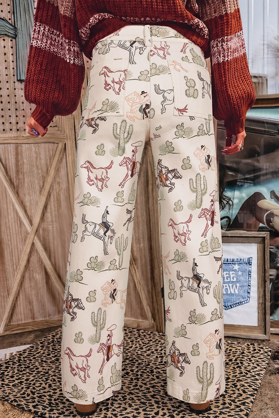 rust jeans featuring pocketed and western print