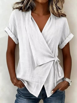 Black wrap top with hip-length and wrap