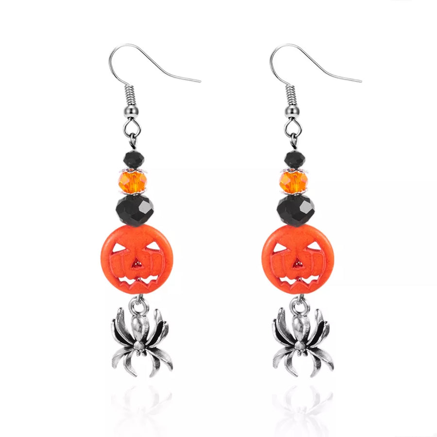 earrings in orange with drop design and long