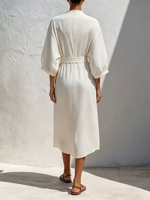 100% polyester Care instructions: Machine wash cold midi dress in Navy with relaxed silhouette