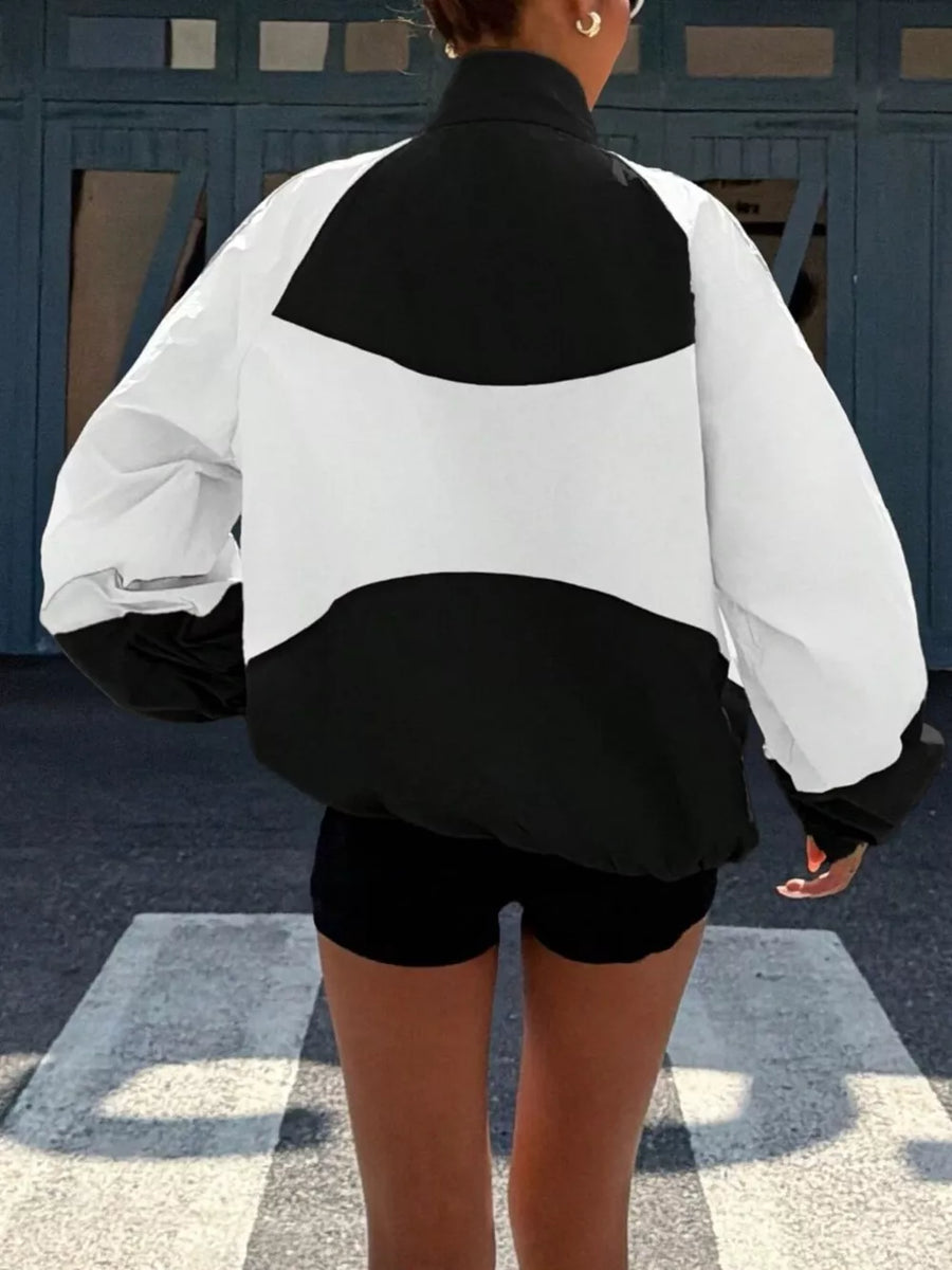 athleisure windbreaker in black with collared
