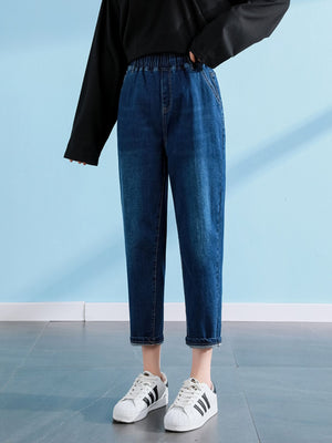 medium wash denim jeans with ankle-length and elastic