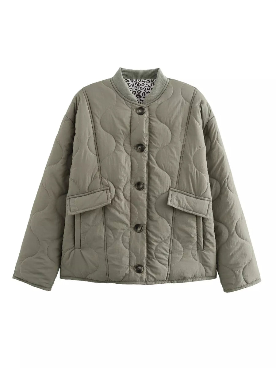Moss green quilted button-down jacket with leopard print lining and chest pockets.
