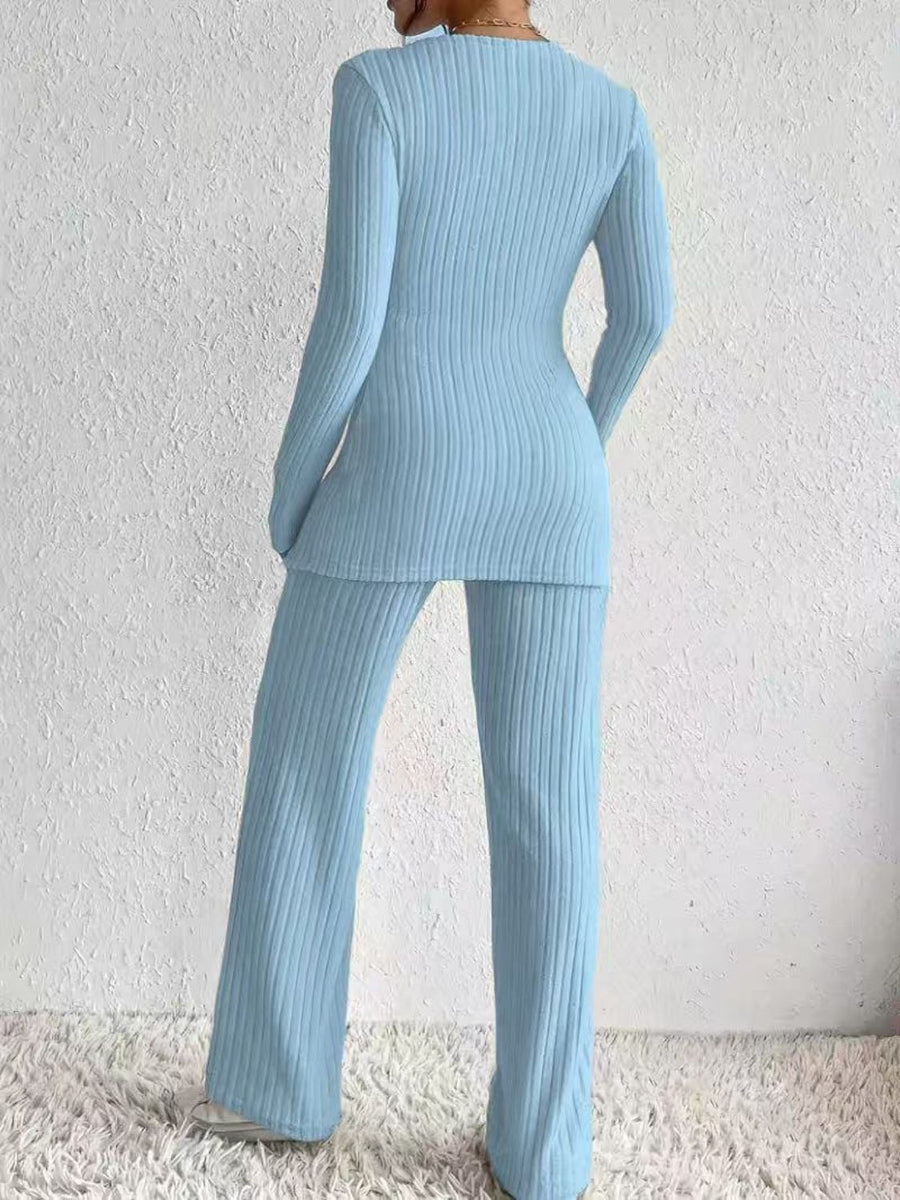 Pastel Blue ribbed knit lounge set with long sleeves and flared pants.