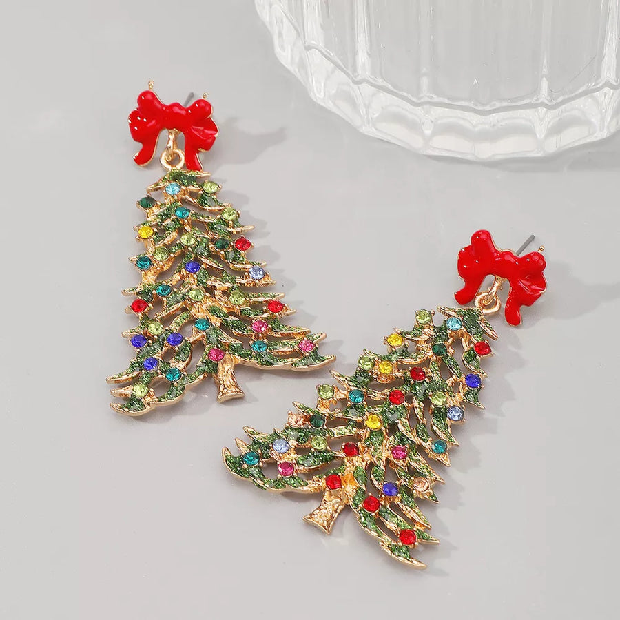 Festive rhinestone Christmas tree dangle earrings with red bows and colorful gems.