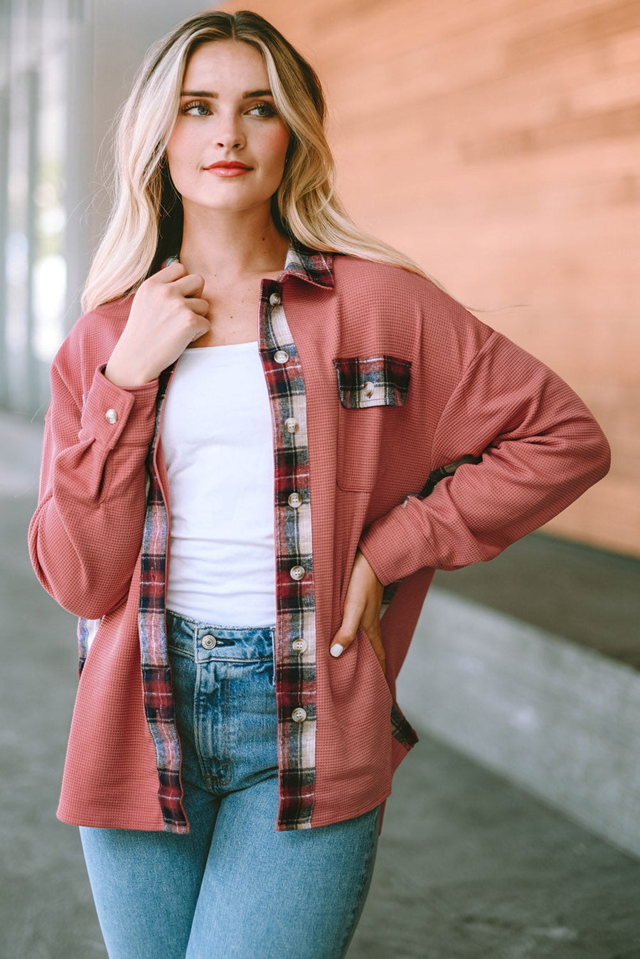 Waffle knit overshirt in blush pink with plaid trim and button front.