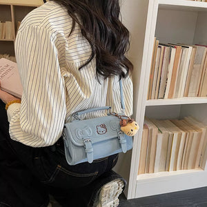 light blue crossbody bag with mini and buckle