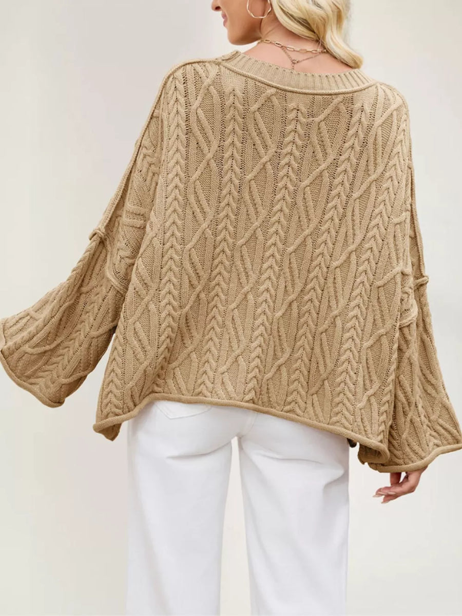 100% polyester Care instructions: Machine wash cold pullover sweater in Apricot with oversized silhouette