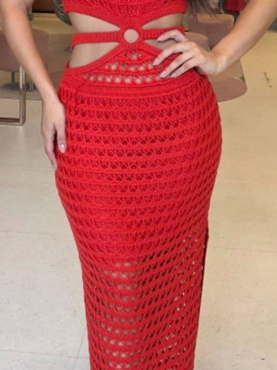 Red crochet maxi skirt with cutout details and ring accent at waist