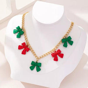 red necklace featuring charm detail and novelty