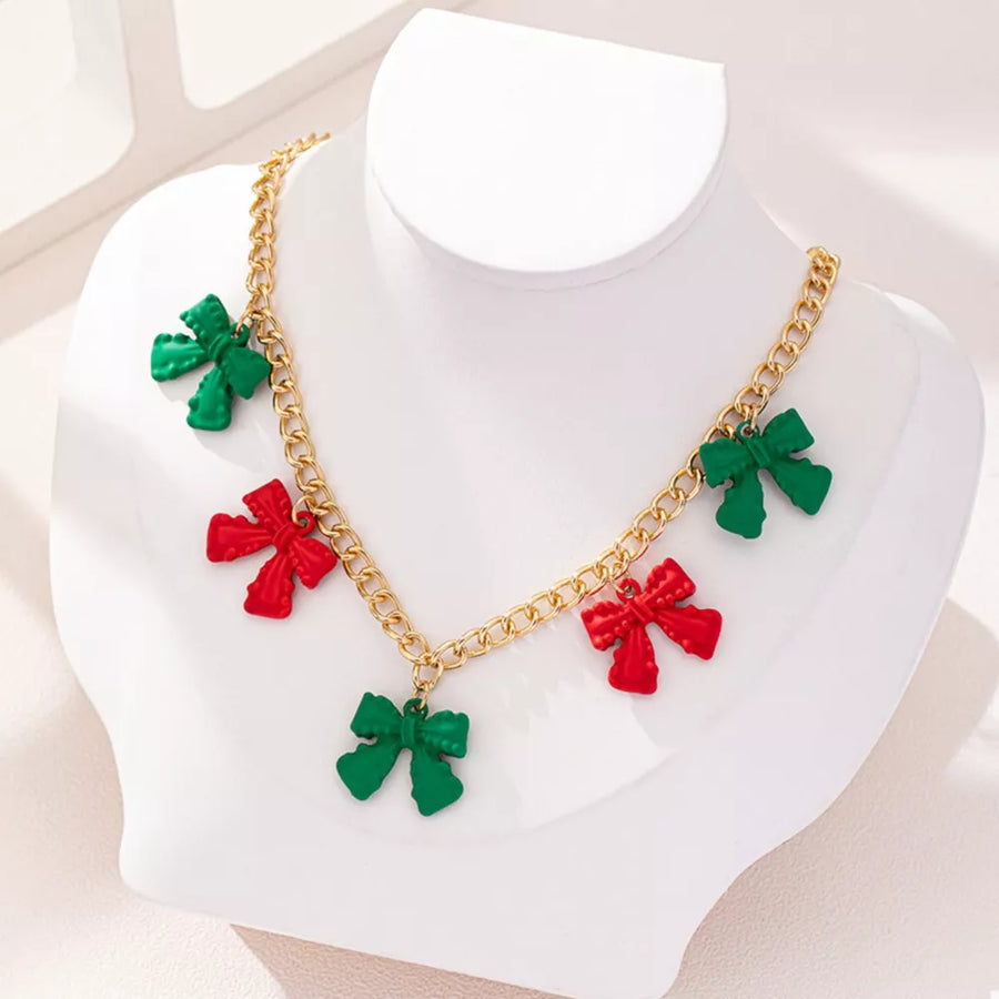 red necklace featuring charm detail and novelty