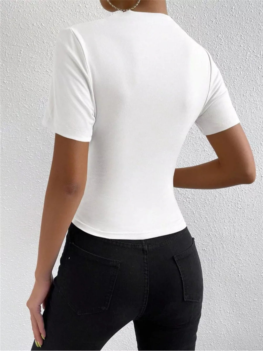 White ruched mock neck t-shirt with short sleeves, fitted silhouette.