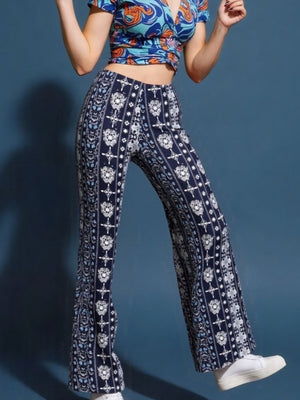 off-white wide-leg pants featuring high-waisted and geometric
