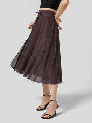 Flowy midi skirt in coffee with drawstring waist and shorts liner.