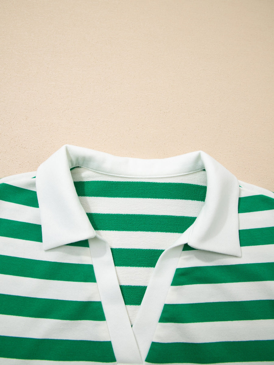 Green and white striped cotton blouse with a white collar and V-neck detail.