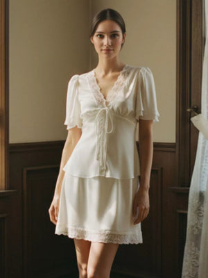 mini dress in ivory featuring lace trim and A-line fit