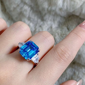 ring in blue featuring gemstone and statement fit