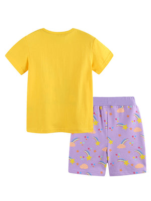 Girls' yellow cotton t-shirt with purple rainbow and star print shorts.