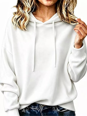 100% polyester Care instructions: Machine wash cold pullover hoodie in White with relaxed silhouette
