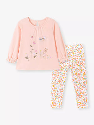 white outfit set featuring embroidered and ditsy floral