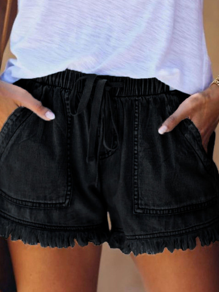 denim shorts in Red with raw hem and mini