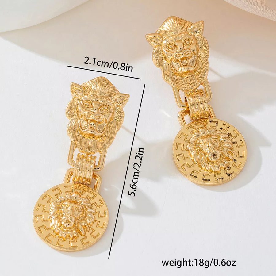 earrings in Gold with animal-print and drop