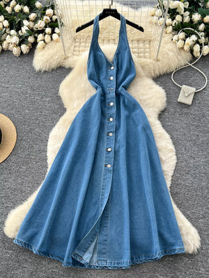 Blue denim halter V-neck dress with button placket and a-line skirt