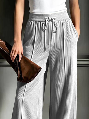 Black wide-leg pants with full-length and drawstring
