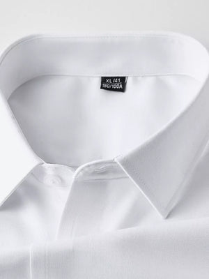 White men's long sleeve shirt with button collar detail and size tag.