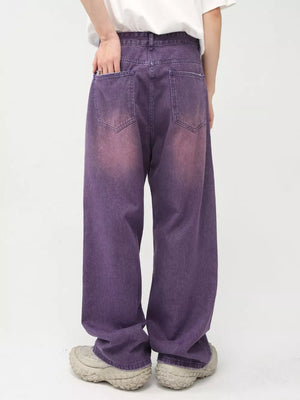 Men's wide-leg jeans in mauve with gradient wash detail and cotton fabric.