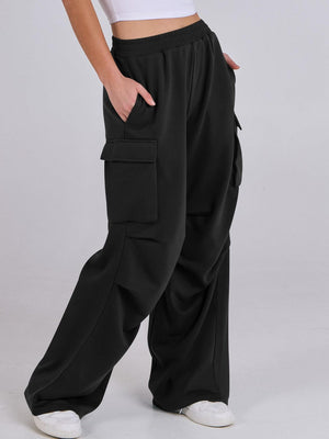 Black sweatpants with cargo pockets and a wide leg cut.