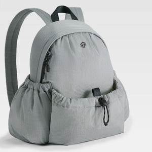 Gray lightweight nylon drawstring backpack with cinched side pockets and a zippered front pocket.